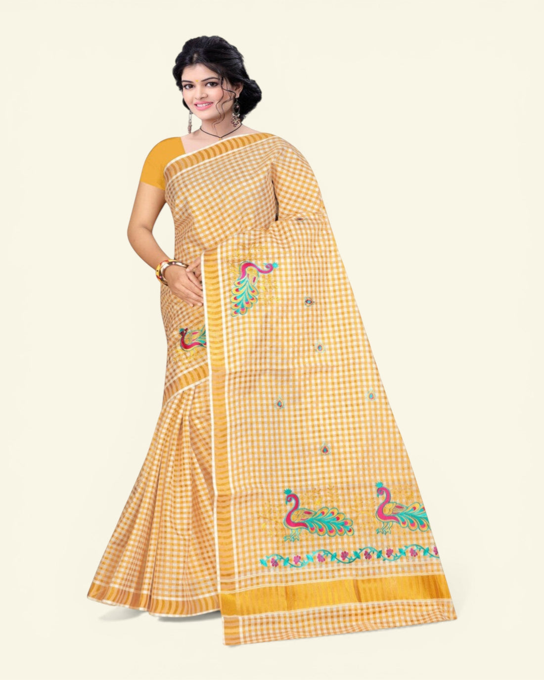 Ambika Stores women's off-white cotton Kerala saree with gold zari checked pattern and peacock embroidery. Includes running blouse.