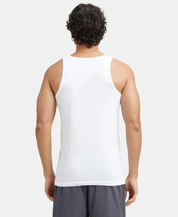 Ambika Stores white super combed cotton round neck men's vest with extended length for easy tuck.