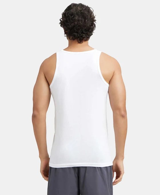 Ambika Stores white super combed cotton round neck men's vest with extended length for easy tuck.