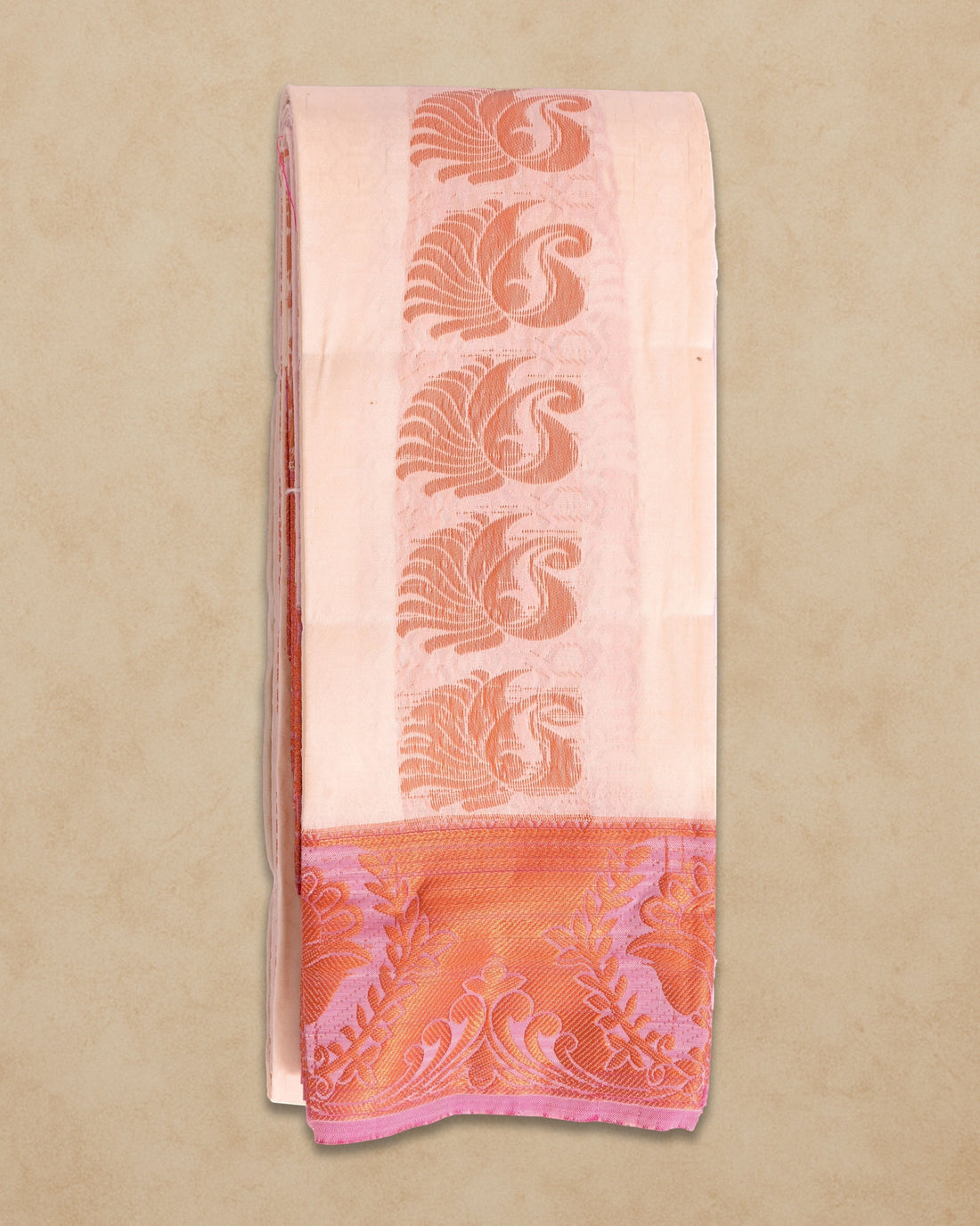 Ambika Stores white silk saree with intricate peach paisley motifs and a contrasting border, perfect for festive occasions.