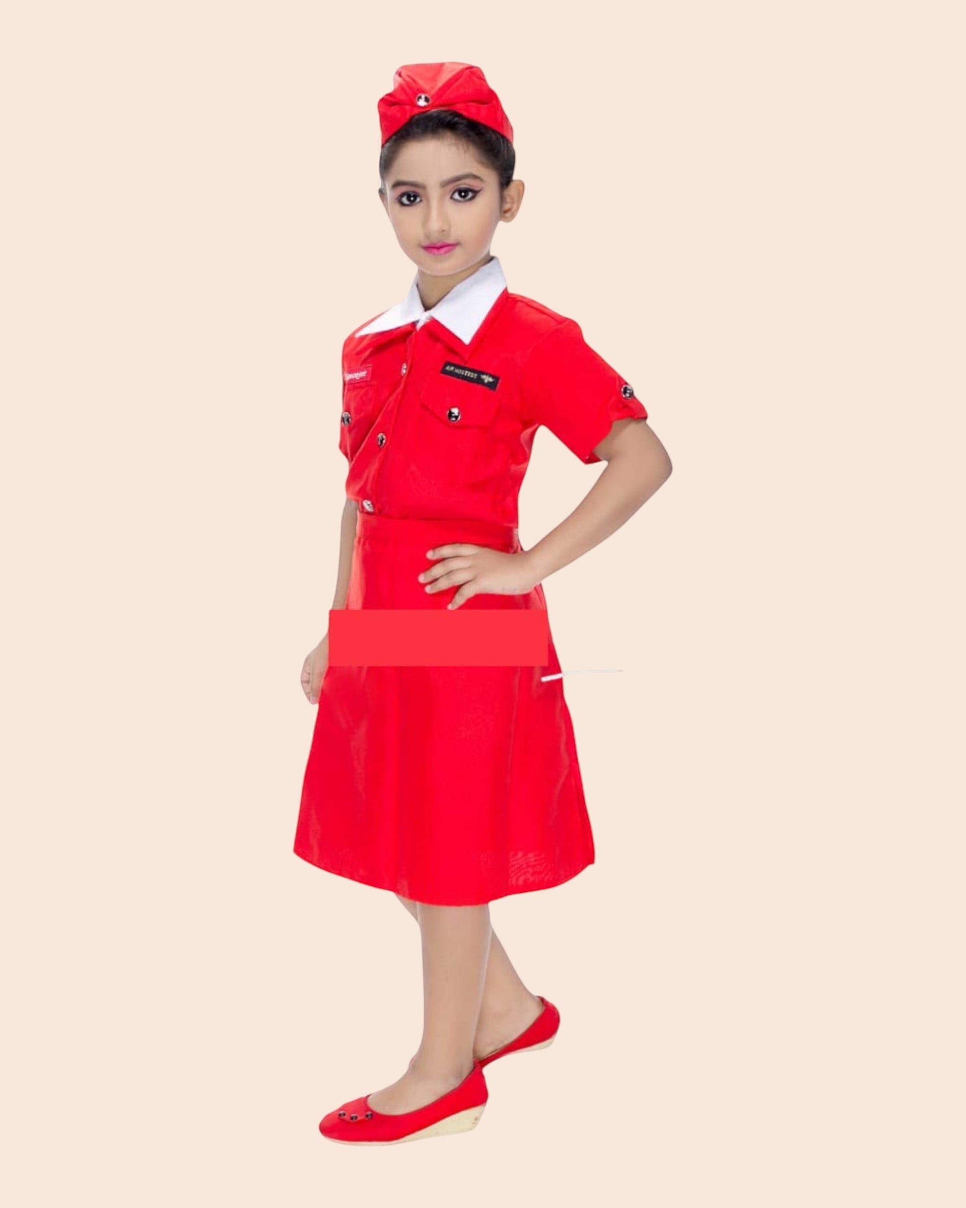 Girl wearing red air hostess fancy dress costume with matching cabin crew cap