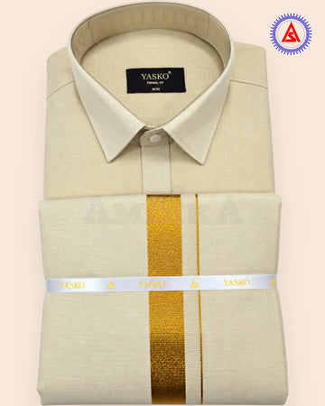 Folded gold shirt and matching dhoti with gold zari border