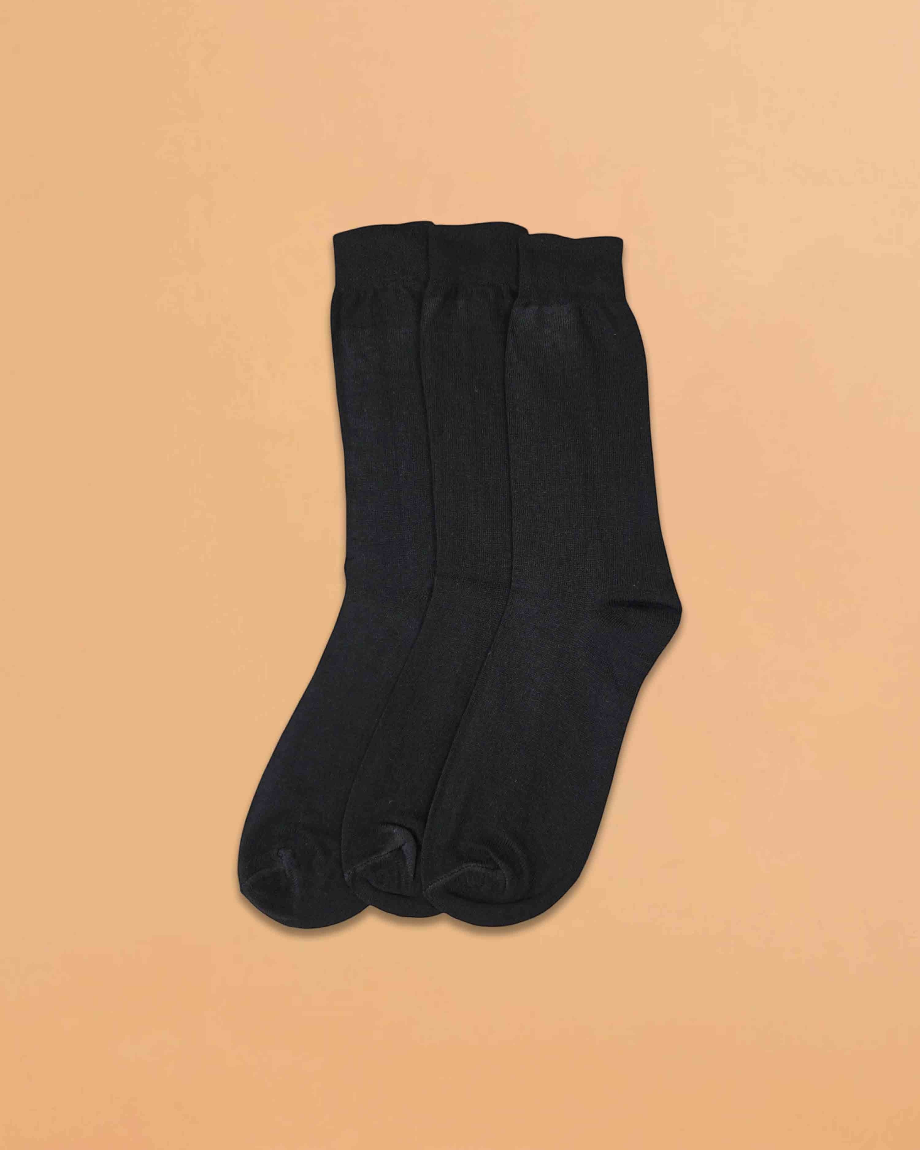 Ambika Stores pack of plain black full-length school socks made from soft organic combed cotton