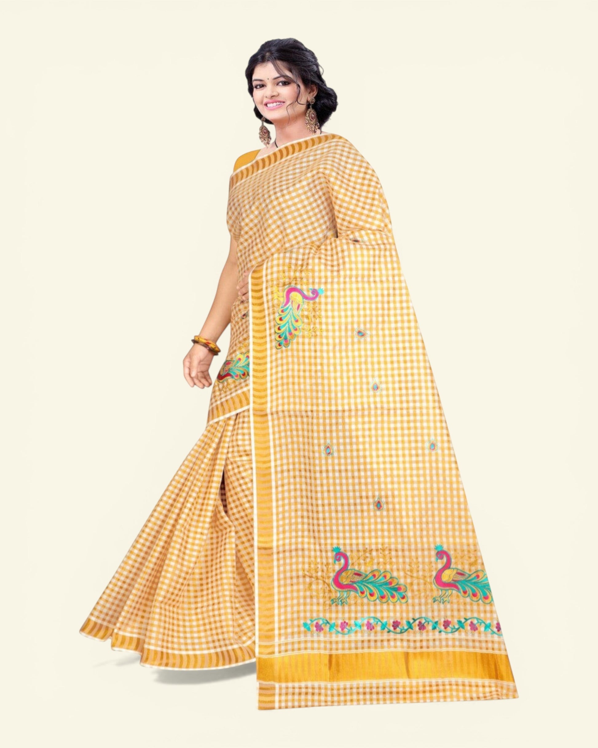 Ambika Stores off-white cream cotton saree with gold zari checked pattern and peacock embroidery. Includes running blouse.