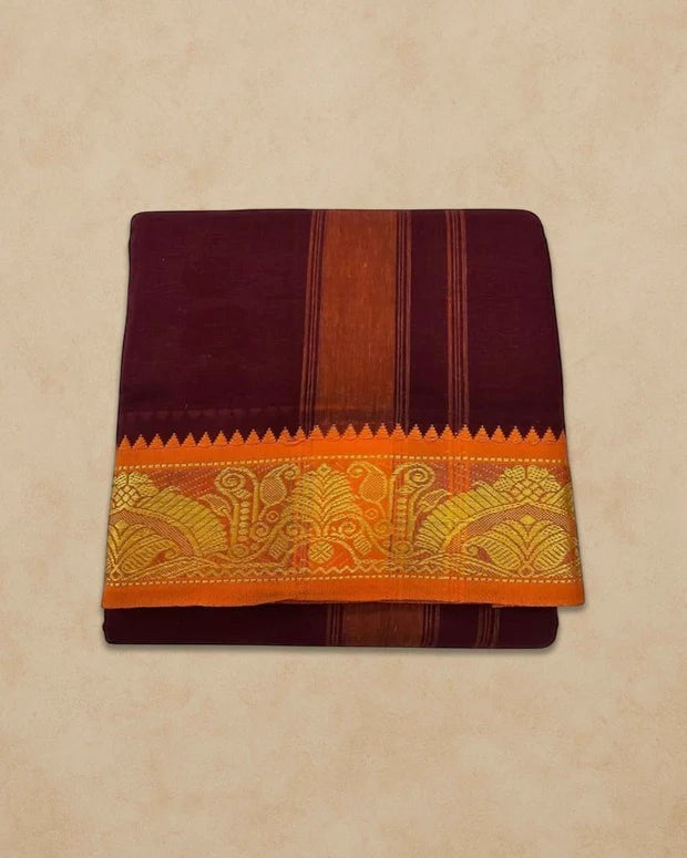 Ambika Stores maroon cotton panjakacham dhoti set with orange and gold zari border featuring traditional motifs
