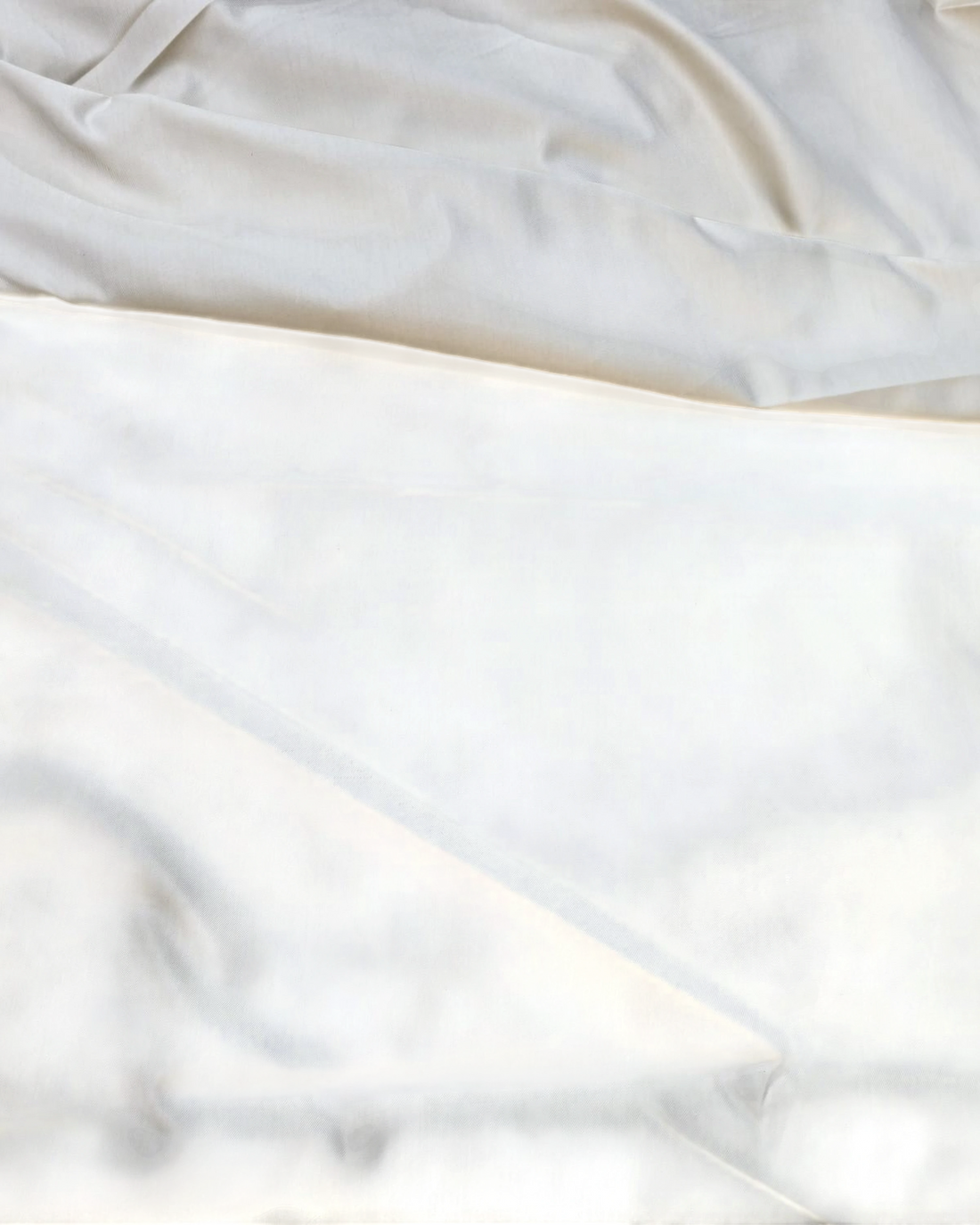 Ambika Stores white Narayana school uniform shirting fabric with a smooth, durable texture.