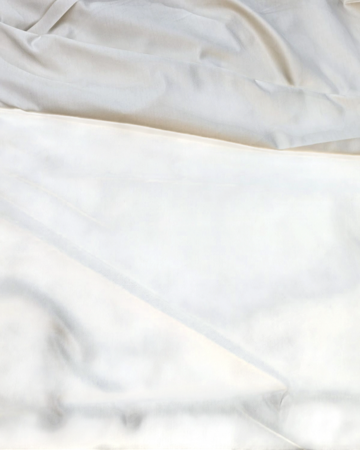 Ambika Stores Narayana school uniform white shirting fabric with a smooth, durable texture.