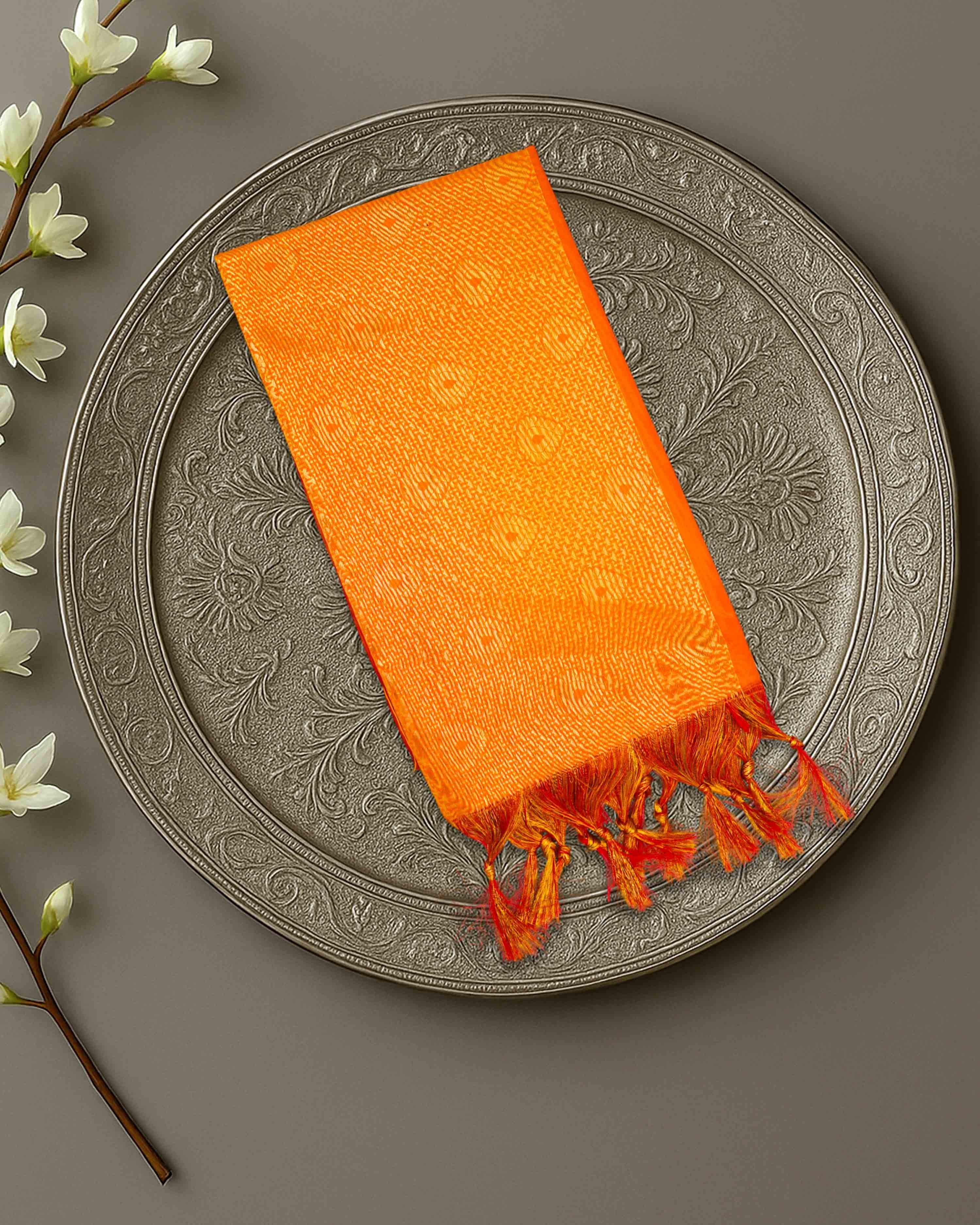 Ambika Stores premium orange Ponnadai Jari shawl with intricate patterns and tassels for weddings and VIP gifting