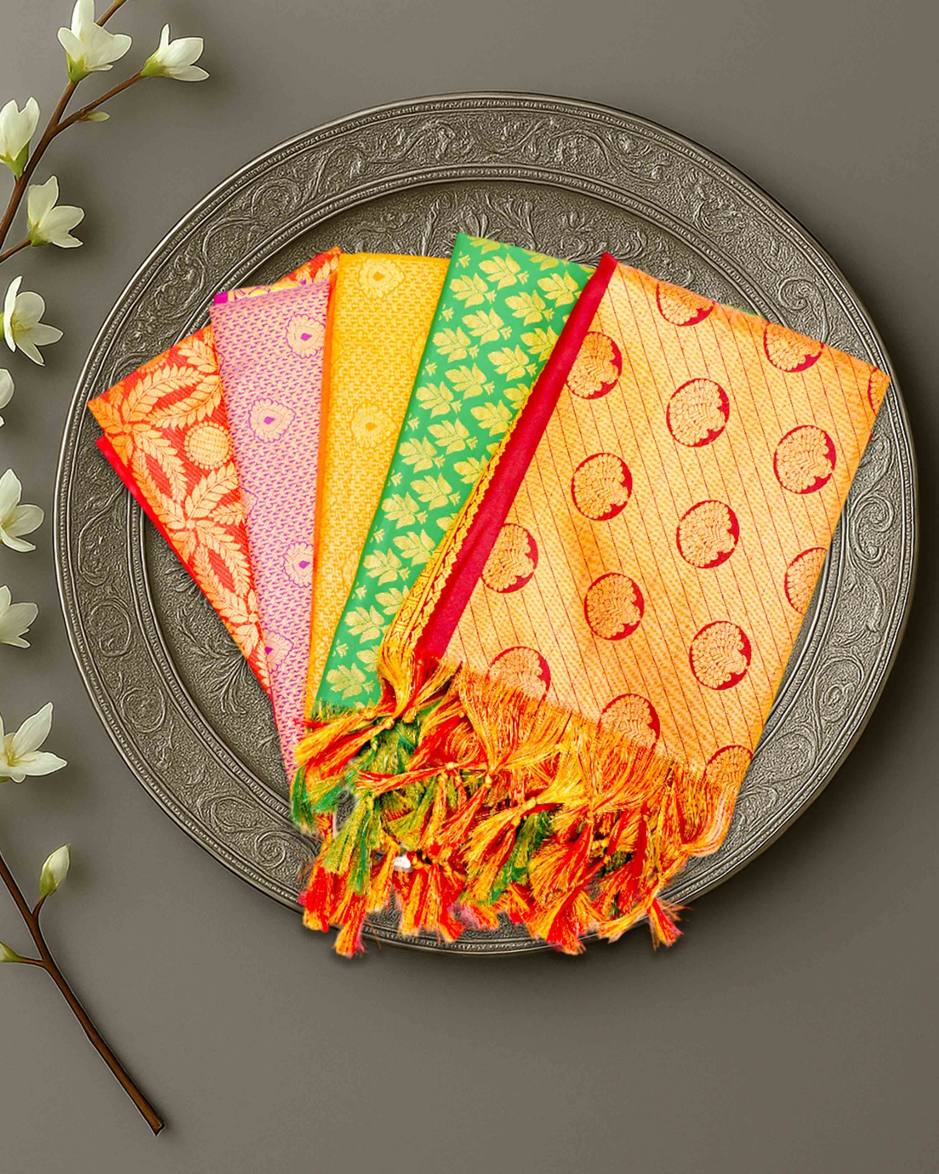 Ambika Stores premium Ponnadai Jari shawls in vibrant colours with intricate gold patterns and decorative tassels.