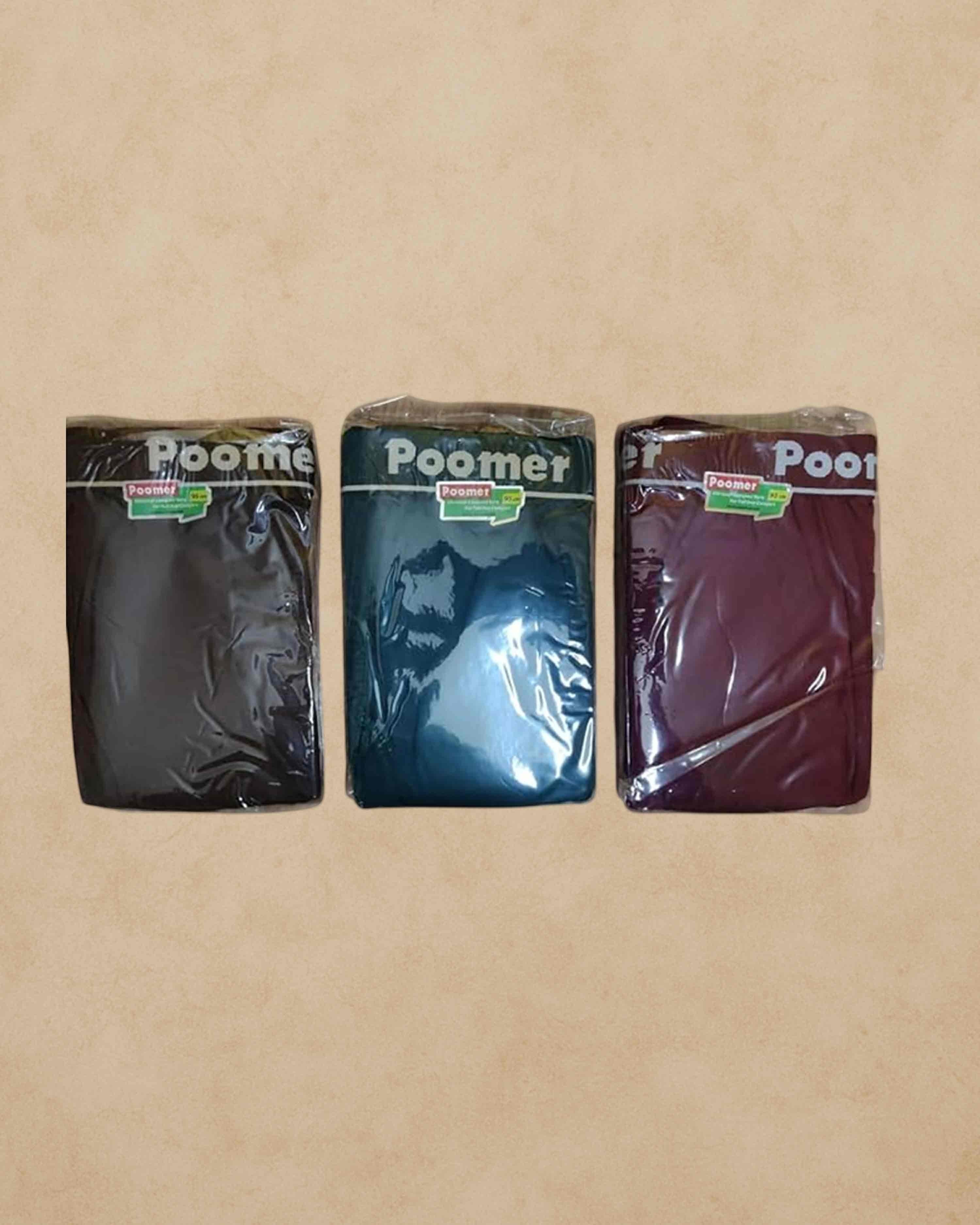 Ambika Stores Poomer cotton pocket trunks in black, teal, and maroon, packaged in three individual plastic wraps.