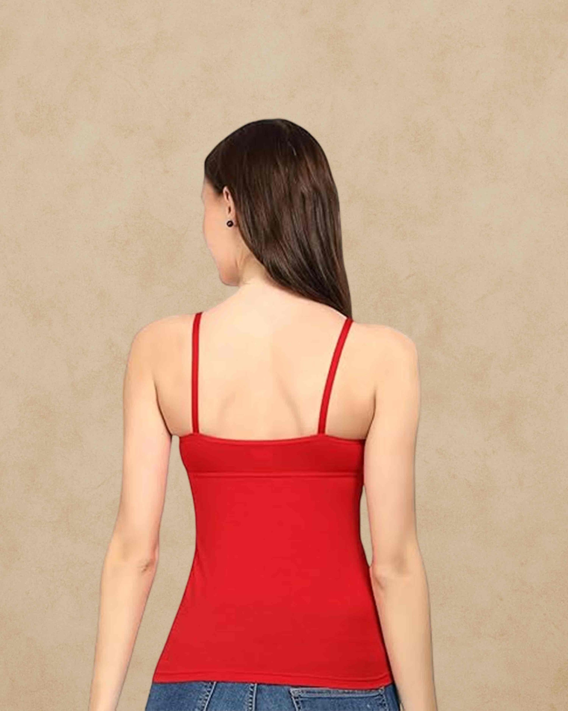 Ambika Stores red camisole slip with built-in bra and adjustable straps worn by a woman, back view.