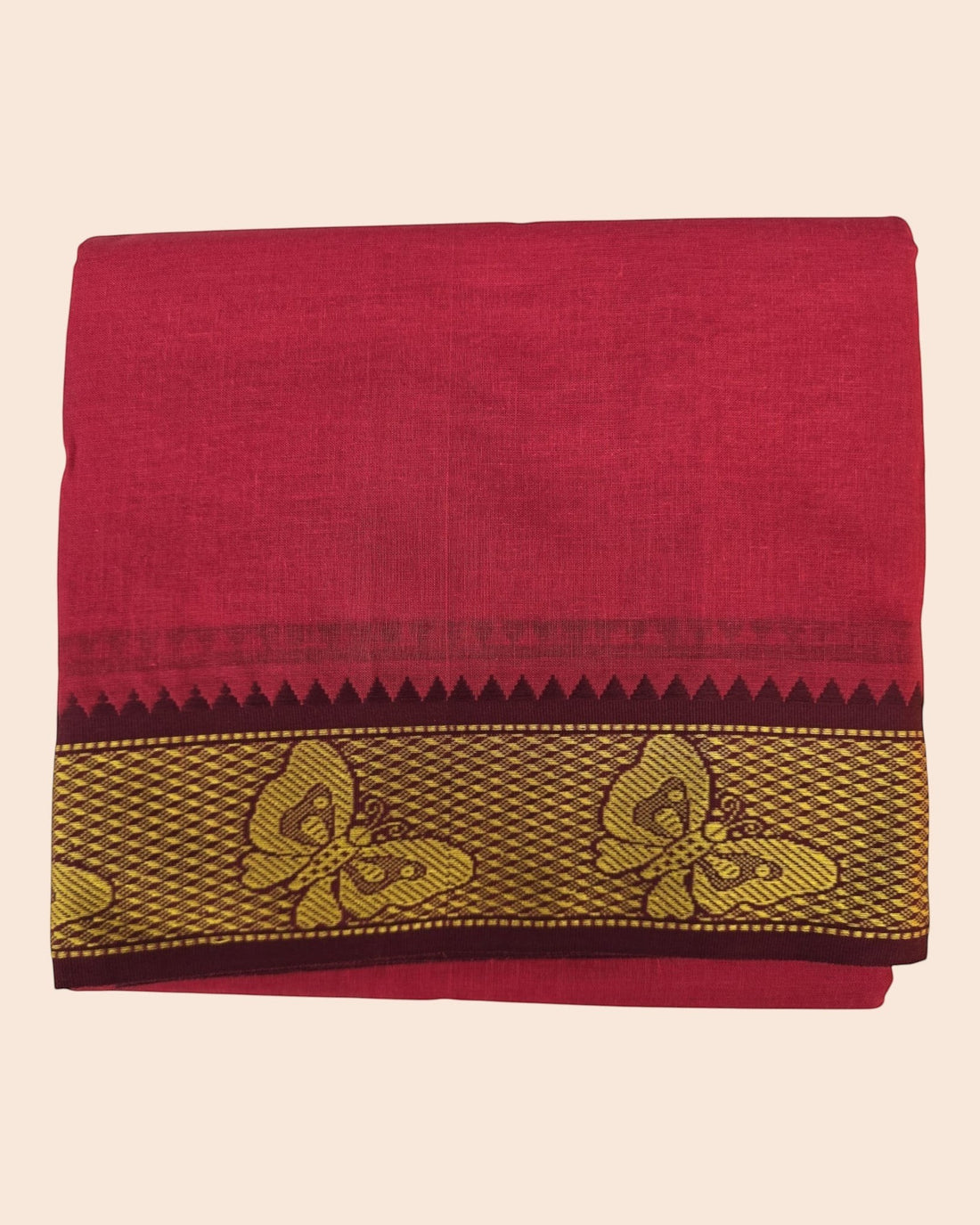Ambika Stores red cotton panjakacham dhoti and angavastram set worn by a man in a traditional temple setting