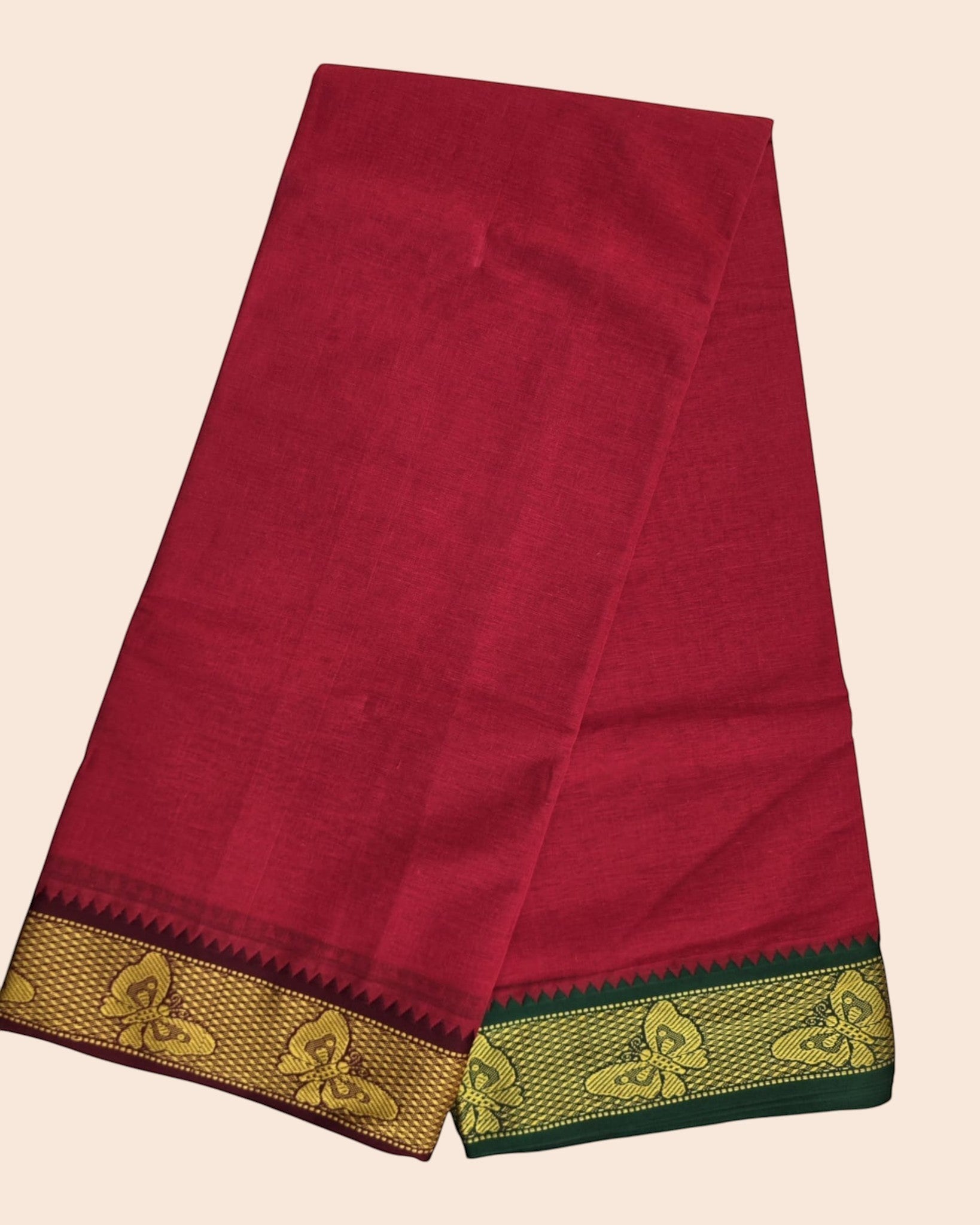 Ambika Stores red cotton panjakacham dhoti with gold zari butterfly border and matching angavastram towel