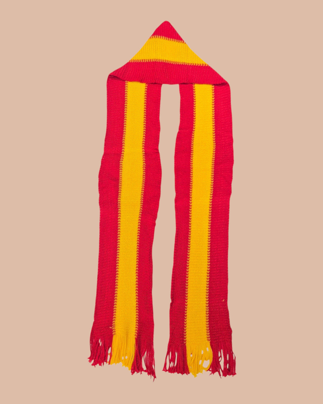 Ambika Stores red and yellow striped dhoti and two mufflers with fringes, ideal for political rallies and campaigns.