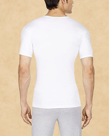 Ambika Stores white combed cotton men's vest with seamless body and flat shoulder seams, back view