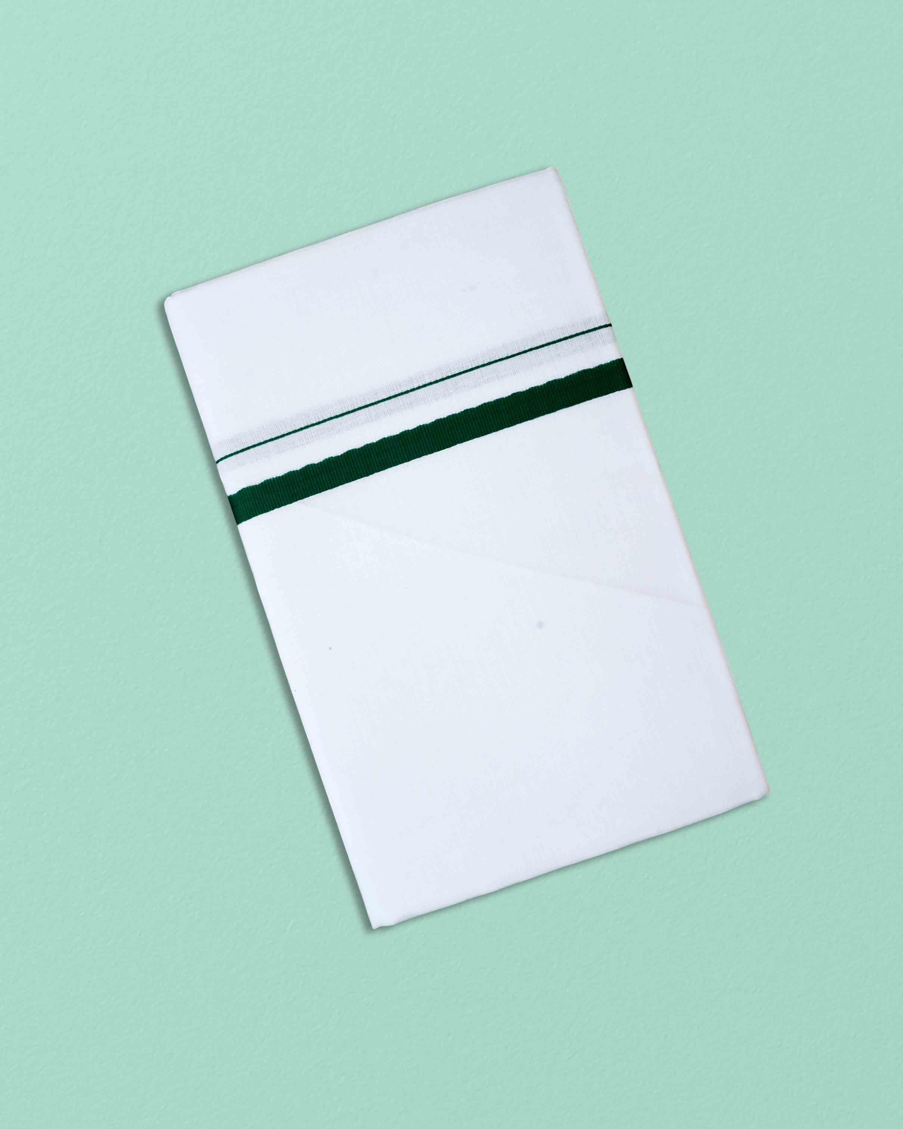 Ambika Stores white cotton dhoti with a single dark green border, folded for traditional wear.