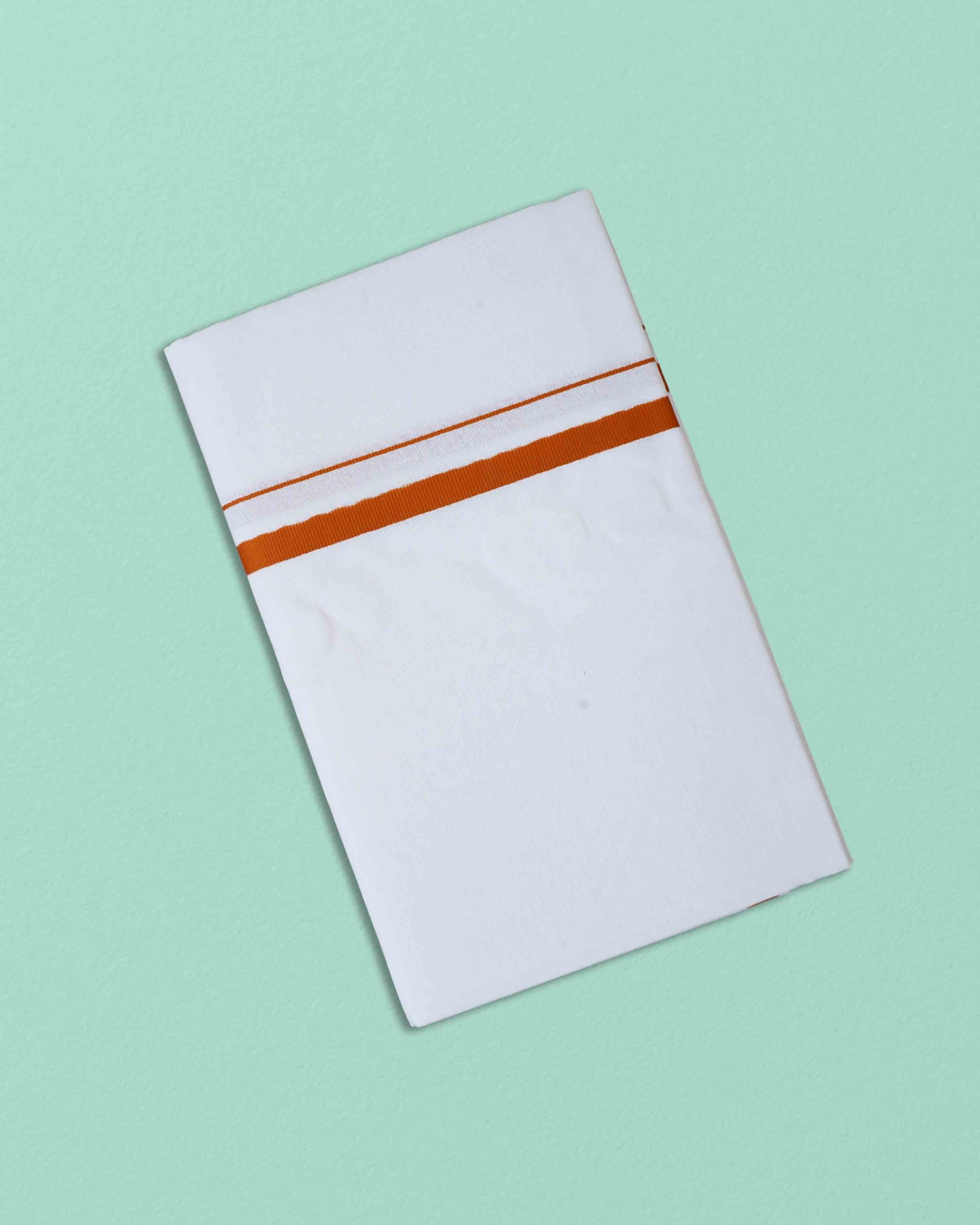 Ambika Stores white cotton dhoti with a thin orange border, folded for traditional wear.