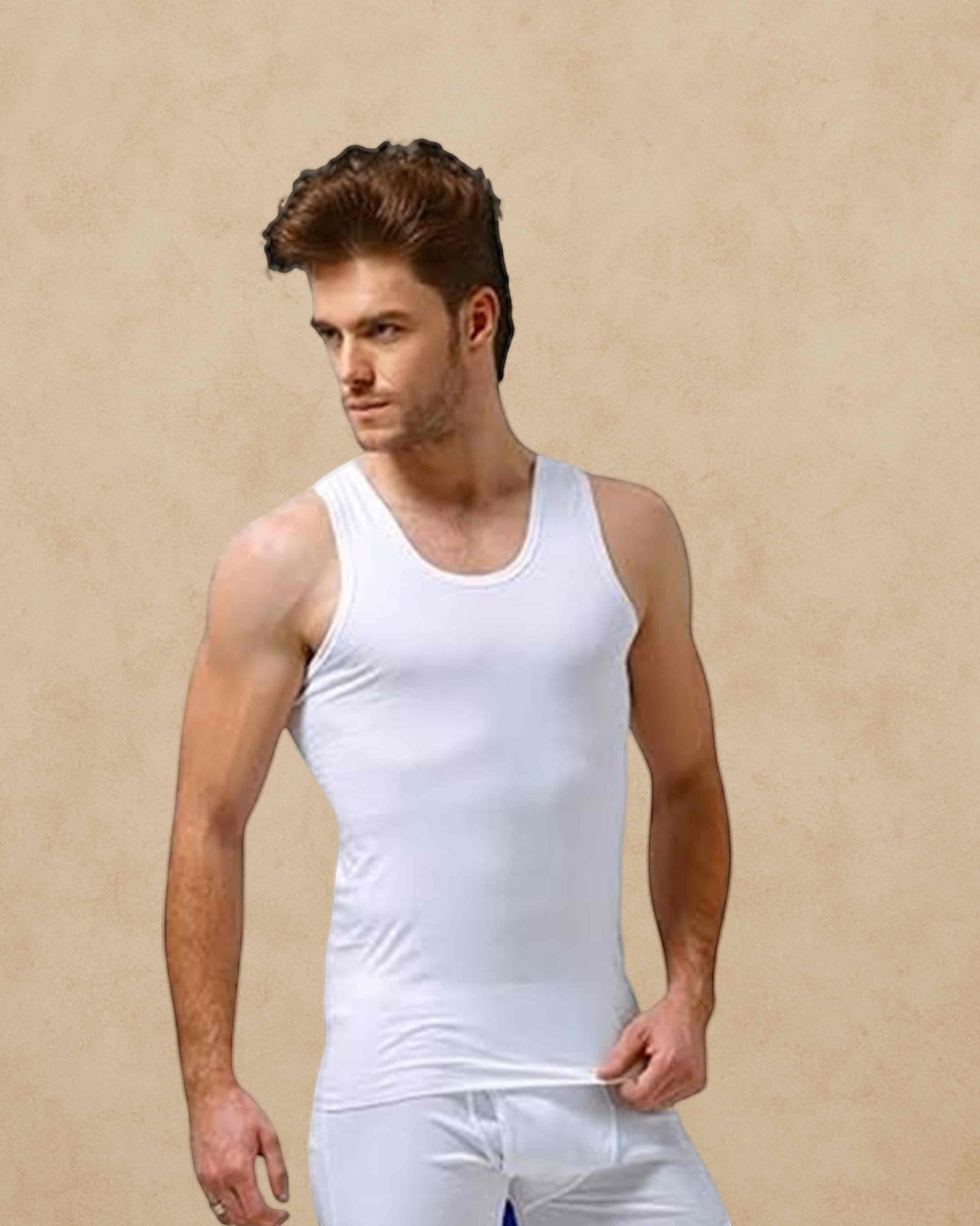 Ambika Stores white cotton sleeveless round neck vest worn by a male model