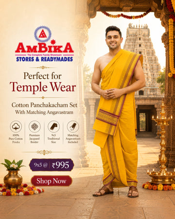 Ambika Stores mango yellow cotton panjakacham dhoti and angavastram set worn by a man in front of a temple.