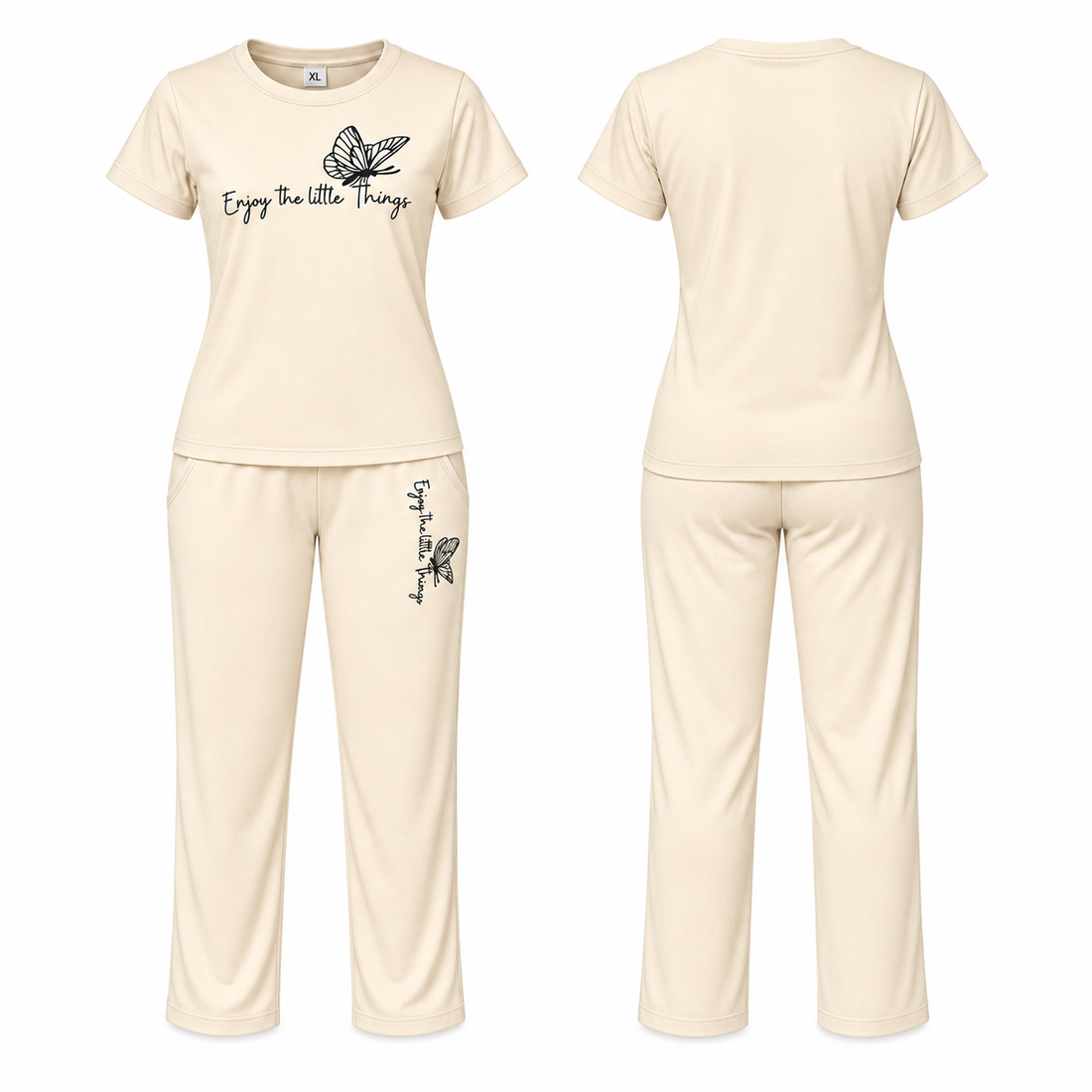 Woman wearing a cream 2-piece lounge co-ord set with butterfly graphic top and matching pants in a bedroom