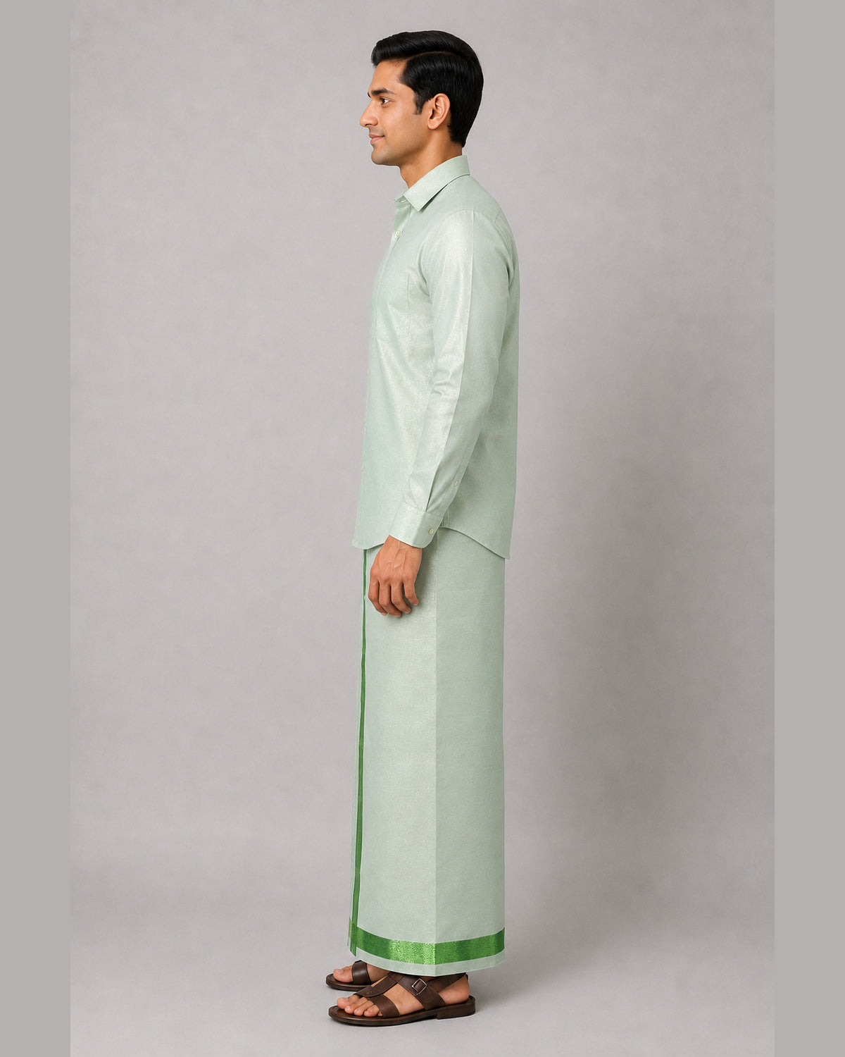 Men’s mint green tissue shirt and single dhoti set with emerald green jari border, model view 2 – Ambika Stores