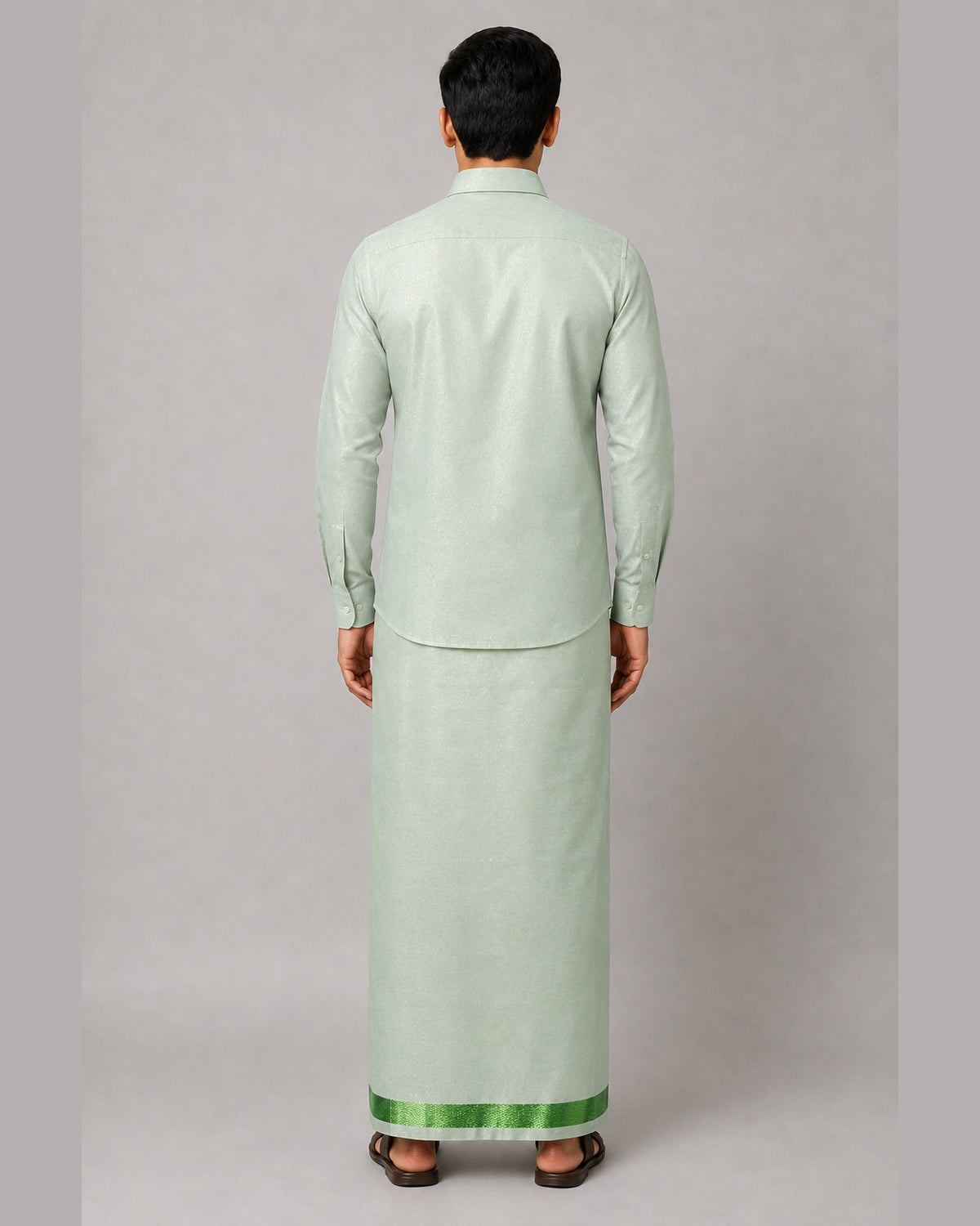Men’s mint green tissue shirt and single dhoti set with emerald green jari border, model view 3 – Ambika Stores