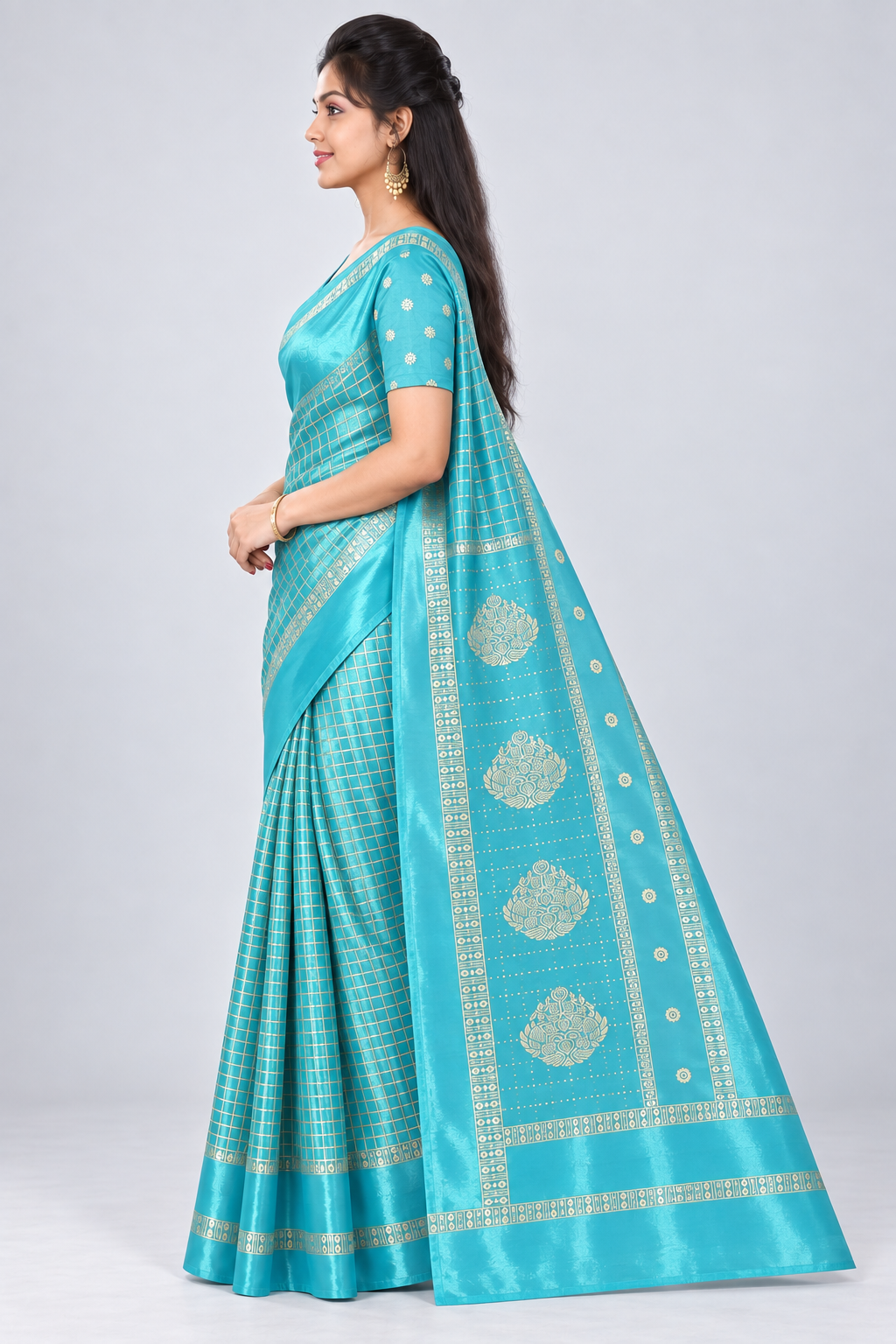 Side view of PARIS BEAUTY aqua blue Turkey Silk saree with gold-tone checks, decorative border and ornamental pallu.