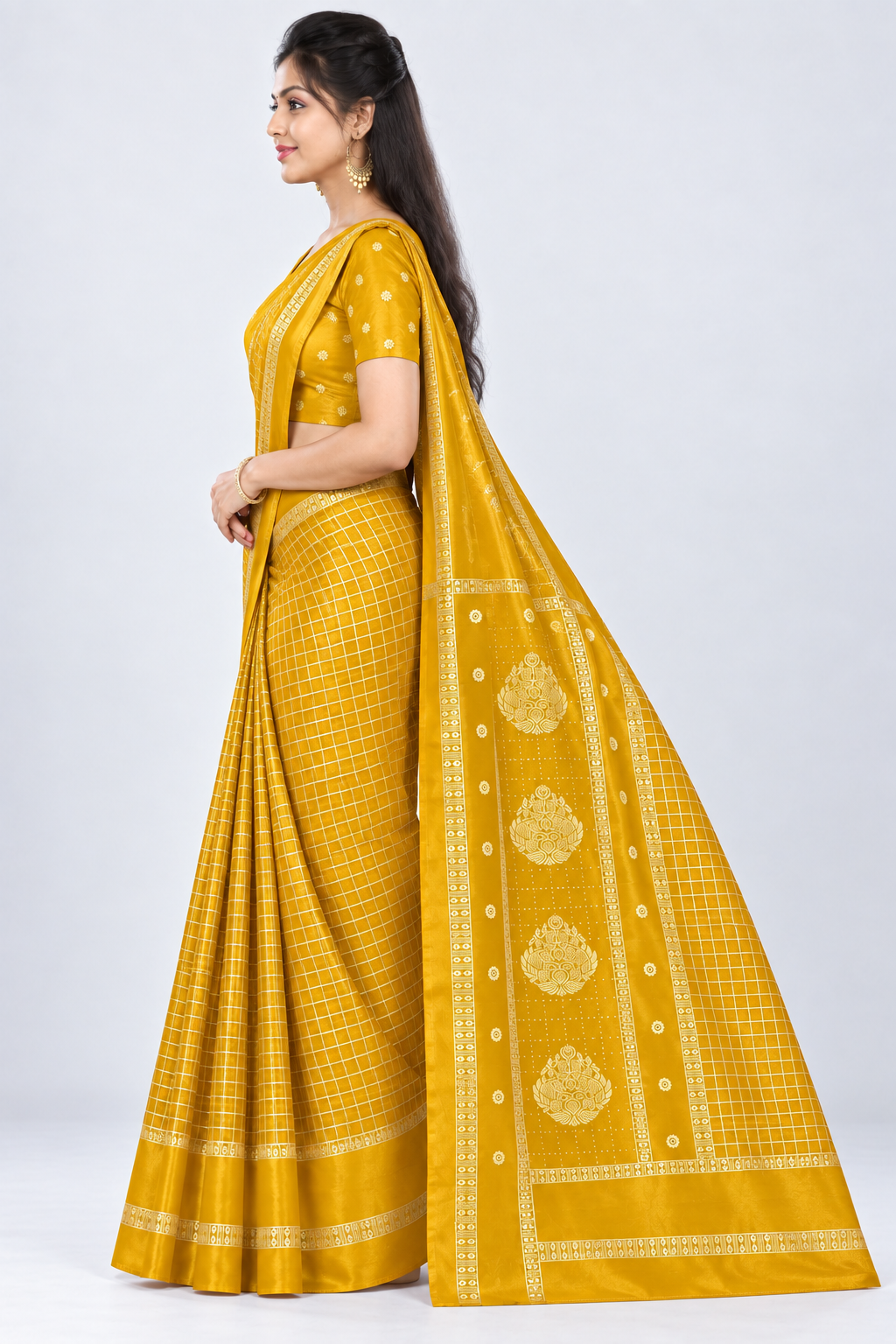 Side view of PARIS BEAUTY mustard yellow Turkey Silk saree with gold-tone checks, decorative border and ornamental pallu.