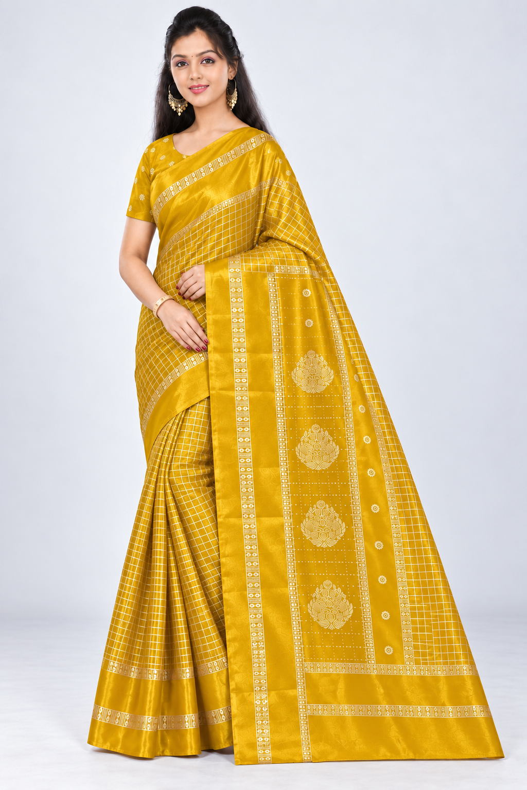 Three-quarter view of PARIS BEAUTY mustard yellow Turkey Silk saree with gold-tone checks, decorative border and ornamental pallu.
