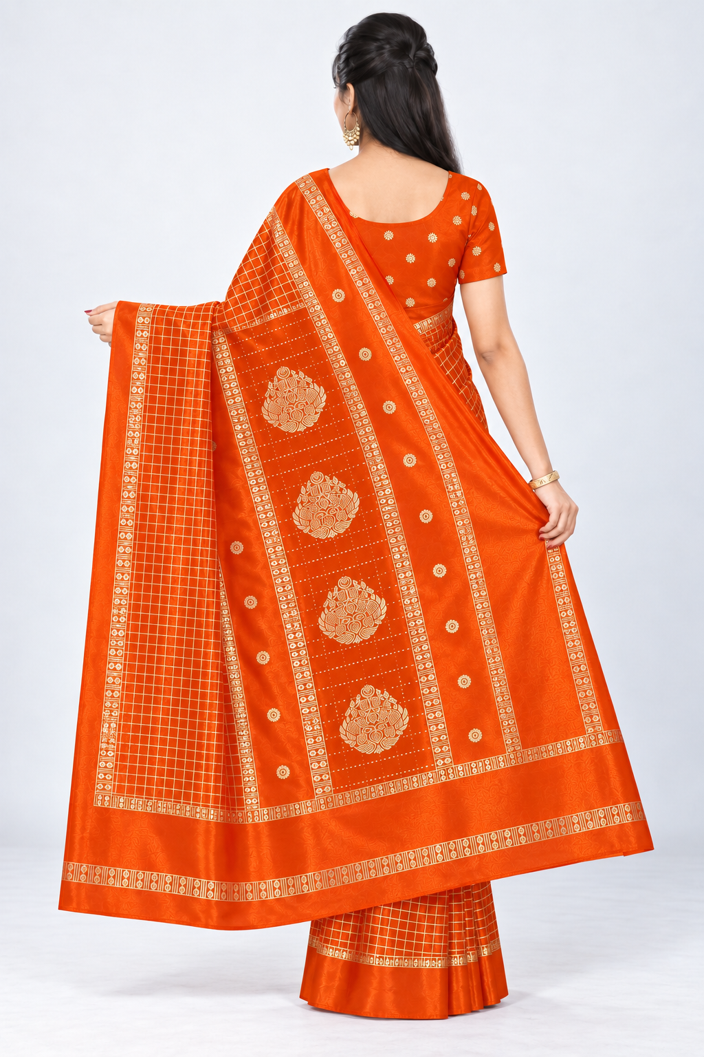 Back view of PARIS BEAUTY orange Turkey Silk saree with gold-tone checks, decorative border and ornamental pallu.