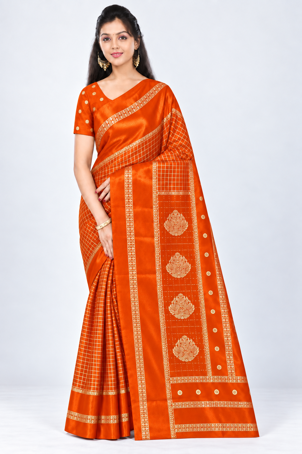 Front view of PARIS BEAUTY orange Turkey Silk saree with gold-tone checks, decorative border and ornamental pallu.
