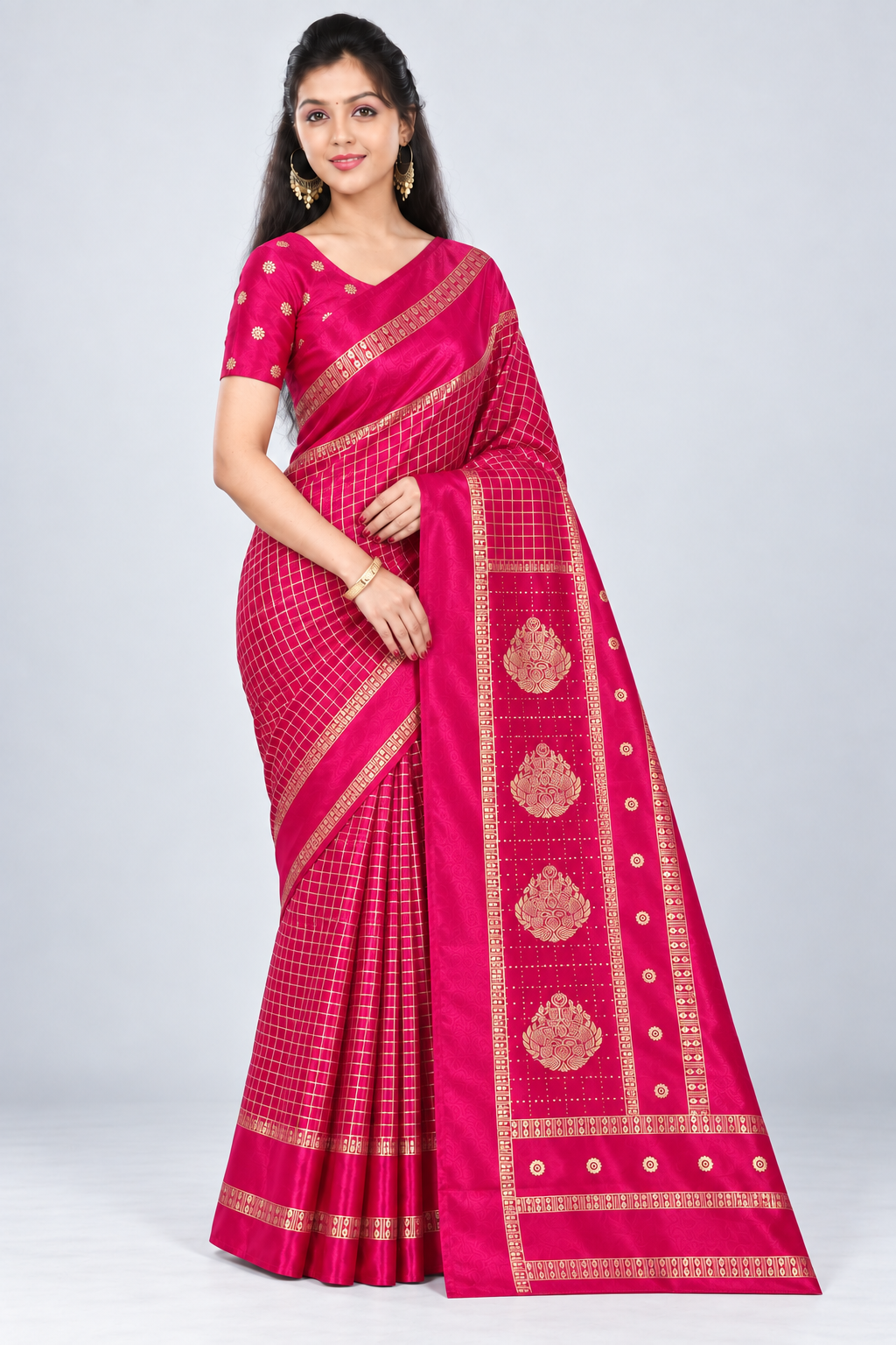 Three-quarter view of PARIS BEAUTY rani pink Turkey Silk saree with gold-tone checks, decorative border and ornamental pallu.