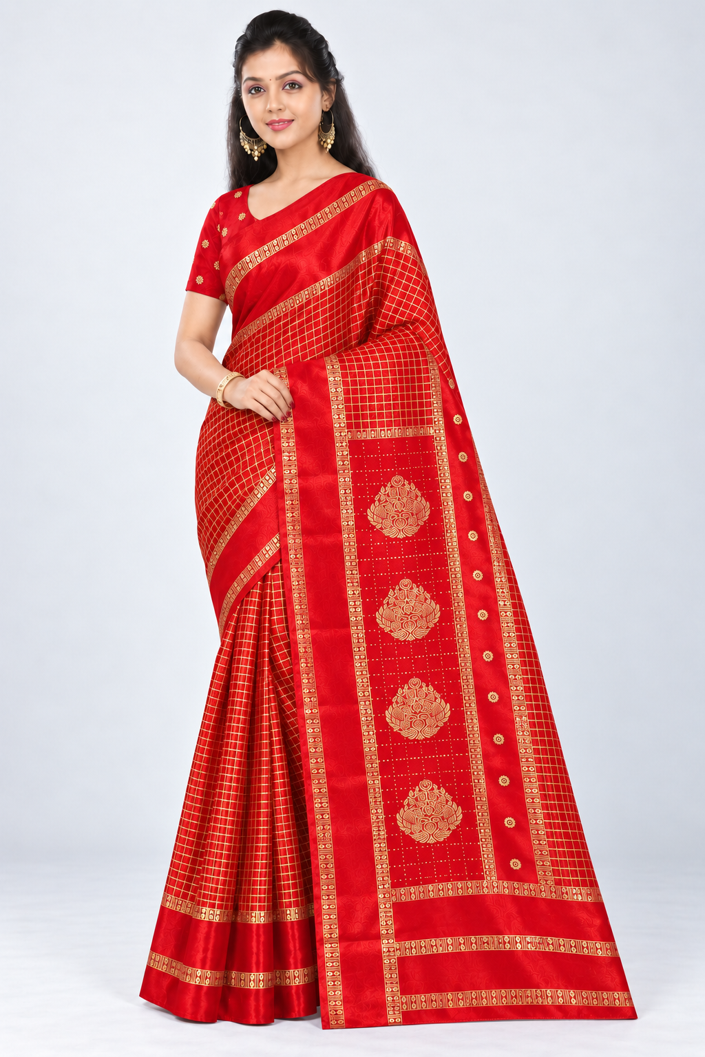 Three-quarter view of PARIS BEAUTY red Turkey Silk saree with gold-tone checks, decorative border and ornamental pallu.